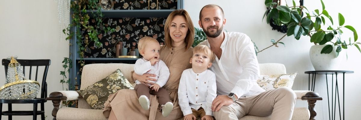 Family relaxing in a cozy, modern living room — representing ZumBuys’ style and home inspiration.